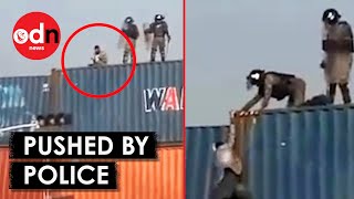 Horrifying Moment Man Praying is Pushed off Container in Pakistan [upl. by Atsugua844]