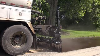 Sealcoating Protecting our roads [upl. by Revlis989]