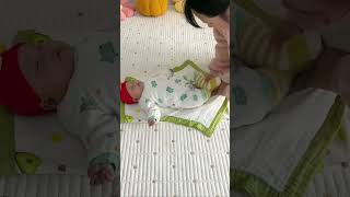 Bath towels wrapped in a blanket baby sleeps soundly babyproducts babymeatende cute babytoys [upl. by Inalaehon]