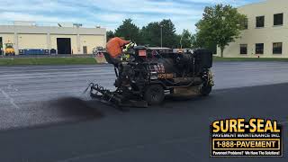 Parking Lot Slurry Sealcoating Process [upl. by Ahsinak37]