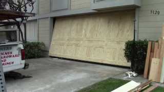 A wood one piece garage door [upl. by Jarus]