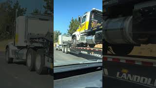 Flatbed tow truck on a flatbed [upl. by Cela]