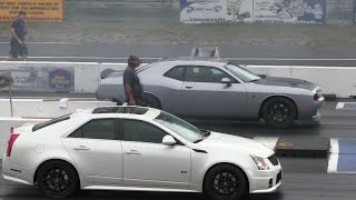 2016 Hellcat battles CTSV Cadillac14 mile drag race [upl. by Hadleigh]