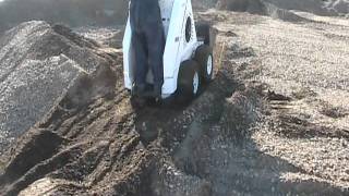 RAMROD Mini Skid Loader 930  working in the dirt pile [upl. by Nessi]