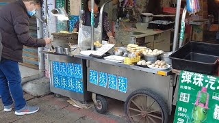 Taiwan Street Food at Danshui 淡水老街 Bird egg Pregnant fish peanut icecream [upl. by Vipul]