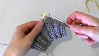 Knitting How to fix a dropped stitch using a crochet hook [upl. by Rehtnug]