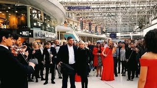 Best Marriage Proposal Ever  Flash Mob Engagement Surprise Orchestra Waterloo Station [upl. by Ahsam]