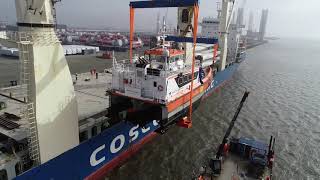 Loading Crew Transfer Vessels onto deck directly from the water [upl. by Rovner836]