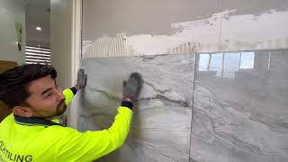 The process of Laying 1200600mm tiles in bathroom walls [upl. by Yonita]