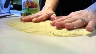 Cauliflower Crusted Pizza Recipe [upl. by Annaeirb]