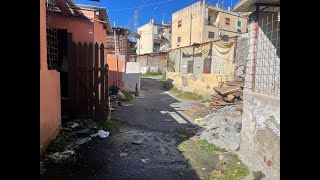 Viaggio nella baraccopoli di via Catanoso Le case costruite sul torrente la paura ad ogni pioggia [upl. by Combes]