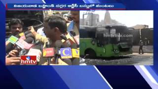 RTC Bus Suddenly Catches Fire in Vijayawada Bus Stand  Passengers Safe   HMTV [upl. by Lekym]