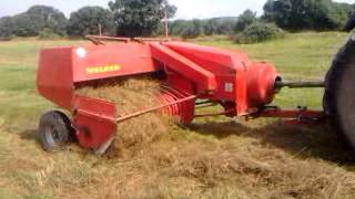 SAME Buffalo 130 Baling with Welger Ap61 [upl. by Araik852]