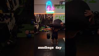 sandbags shoulder day sandbag sandbagtraining strongman strenth strenthtraining [upl. by Goddart]