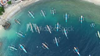 Aerial view of rows of fishing boats in the sea [upl. by Spiers]