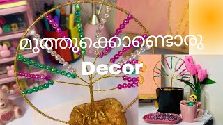 വീണ്ടും മുത്തുക്കൊണ്ടൊരു Decor 🌺Cute desk decor  Easy diy Home decor Diy beads flowers diy [upl. by Geldens]