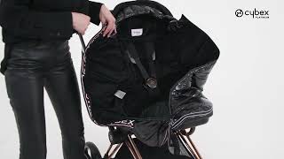 How to Attach the Platinum Winter Footmuff I PRIAM Stroller Accessories I CYBEX [upl. by Cleres]