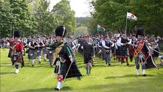 Massed Pipes and Drums morning parade during the 2022 Gordon Castle Highland Games in Scotland [upl. by Illah]