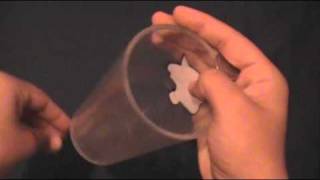 Magic Tricks Revealed  Coin Thru Glass HD [upl. by Enitsyrk414]