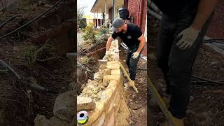 The final touches on a Sandstone Wall stonewalling canbera landscaping [upl. by Claman]