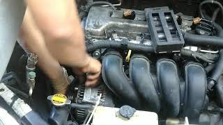 How to replace the alternator in a Toyota corolla 0311  Como poner el Altermador facil [upl. by Holihs]