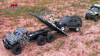 Custom built 6x6 SCX10 Honcho recovery flatbed tow truck hauling Land Rover Discovery 3 demo [upl. by Ailana845]