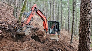 Sketchey steep rocky ATV trail with the Kubota KX 040 4 excavator [upl. by Favrot]