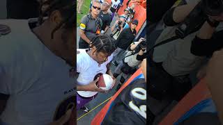 Lamar Jackson Signs lil Kid Ball after Ravens win [upl. by Alul]