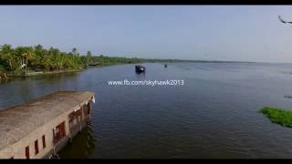 Aerial stock footage Cursing through the backwaters of Kerala India [upl. by Ahsahs282]