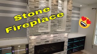 Stacked stone Fireplace setting the stone [upl. by Nnylodnewg]