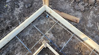 Framing footing forms and laying rebar [upl. by Hurley]