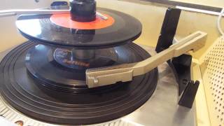 Silvertone record player playing a stack of 45 RPM records [upl. by Otsuaf799]