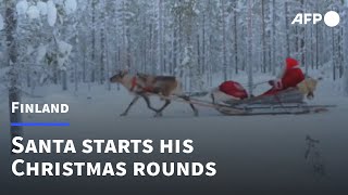 Santa Claus leaves Lapland with reindeer sleigh to deliver gifts  AFP [upl. by Tubb320]