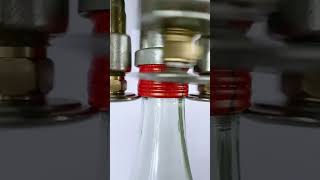 Effortless Bottle Cap Fixing with HighSpeed Machine [upl. by Talanta]