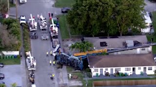 Crane collapse between 2 NE MiamiDade buildings causes diesel spill power outage [upl. by Ynabla]