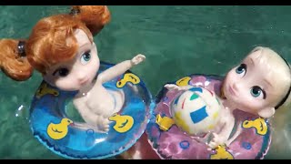 Elsa and Anna toddlers swimming pool fun with Ariel swim splash beach and underwater adventure [upl. by Pfister941]