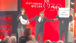 Protesters interrupt Scotiabank Giller Prize gala [upl. by Letney233]