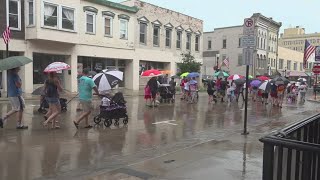 A little rain cant stop people in Muscatine from celebrating the Fourth of July [upl. by Oremar153]