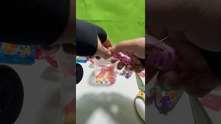 The sound of unwrapping a lipstickshaped candy 💄 with a girl figure asmr candy shorts [upl. by Farver]