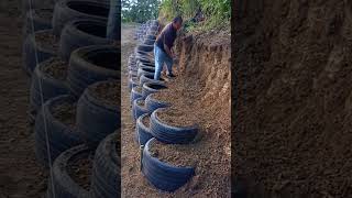 Slope protection building process with tires [upl. by Dnalel]