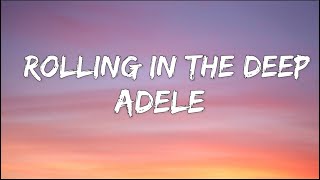 Adele  Rolling in the Deep  Lyrics [upl. by Aedrahs996]