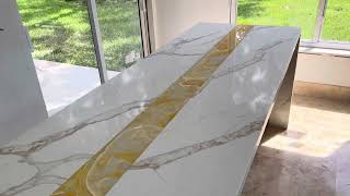 Calacatta Quartz and Onyx kitchen countertops 😍 custom made island with onyx and quartz 😍 [upl. by Home65]