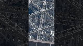 Man climbing the Eiffel tower during the Olympics [upl. by Aralomo233]