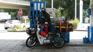 Part 2 Germany and Austria Netherlands to Australia on a Honda C90 Cub Escape from the race [upl. by Vashtee778]