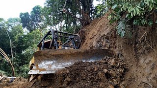 Very high risk work Extreme Bulldozer D6r Xl cuts hills to make new roads on the edge of the ravine [upl. by Reiter]