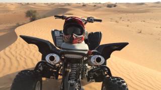 Barker Exhaust  Raptor 700 2014  Dubai Desert [upl. by Ellehsor485]