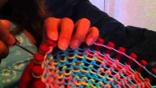 Loom Knitting A Hat [upl. by Shelman221]