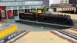 HO scale Norfolk and Western 1218 leaves the roundhouse to start its excursion tour [upl. by Ahsiekam140]