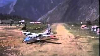 Plane landing at Lukla Airstip in the Khumbu Nepal [upl. by Eixirt]