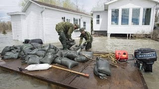 Mauricie region of Quebec prepares for more flooding [upl. by Lleumas]